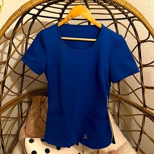 Good condition Jaanuu scrub top - S